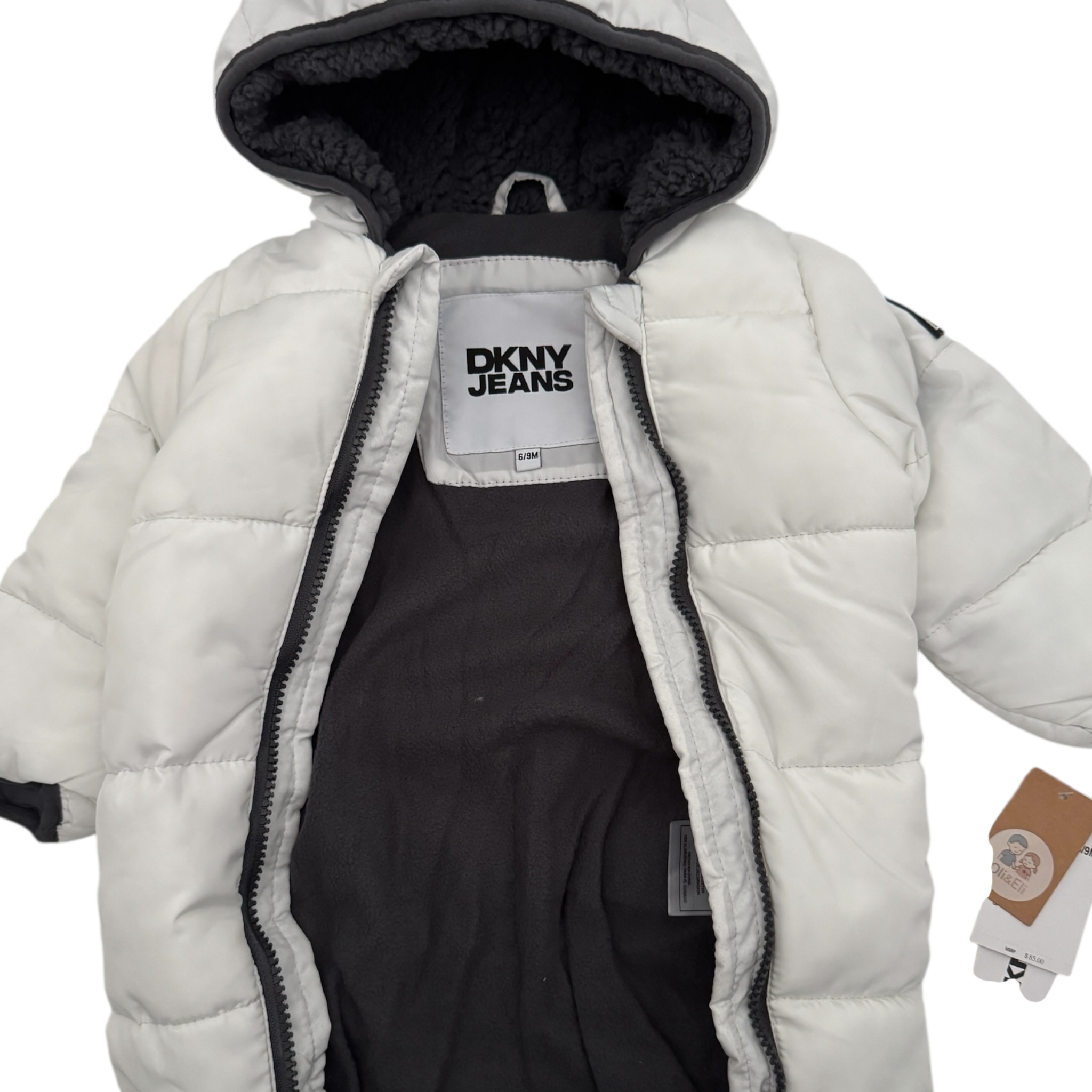Bílá prošívaná zimní kombinéza DKNY