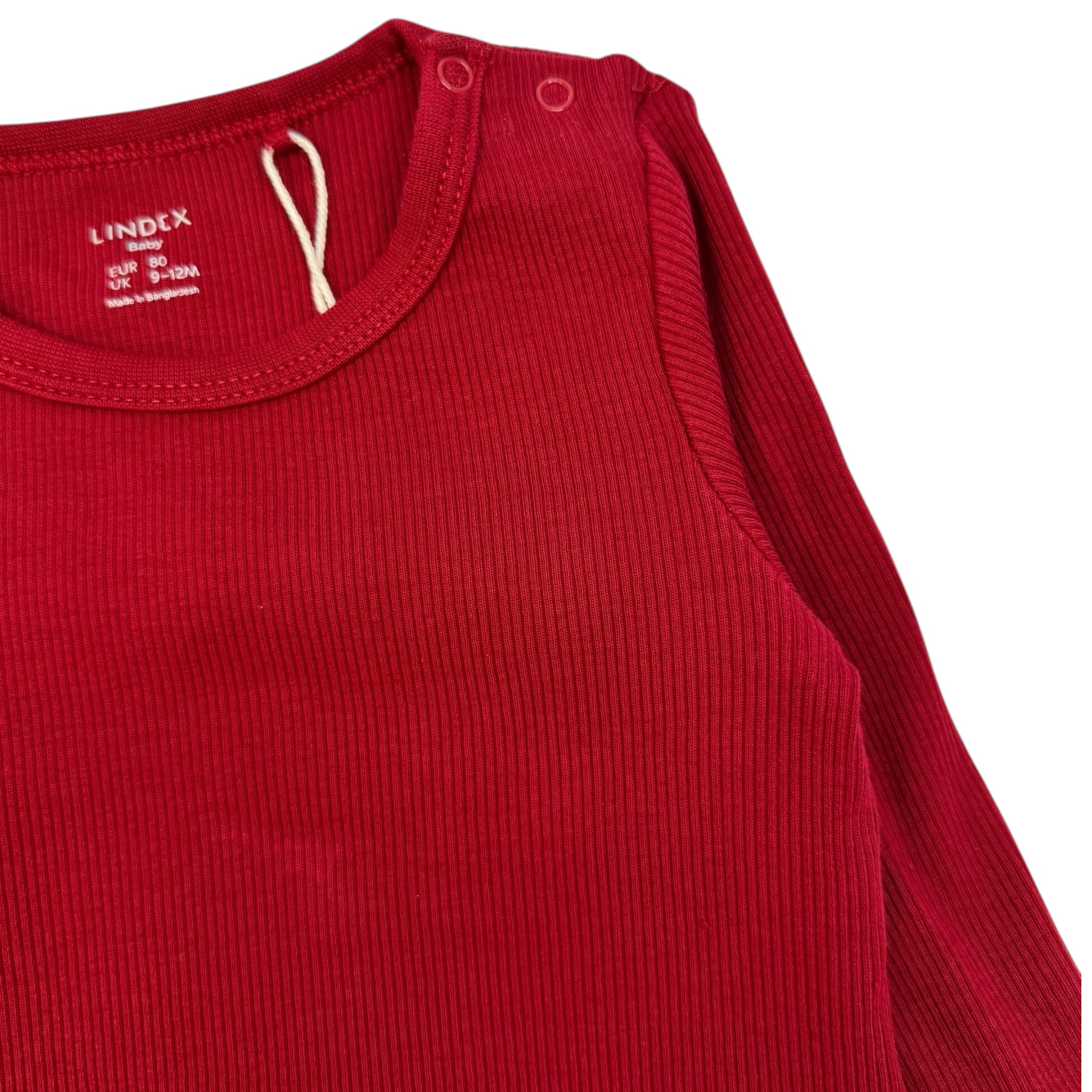 Červené rostoucí body Lindex