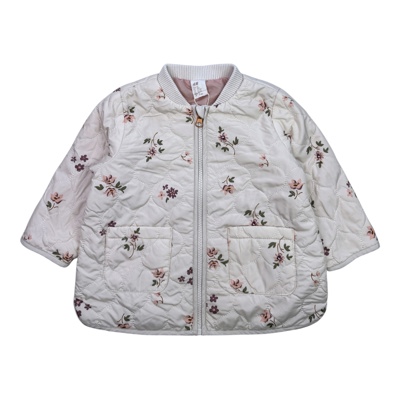 Krémový prošívaný bomber s motivem květin H&M