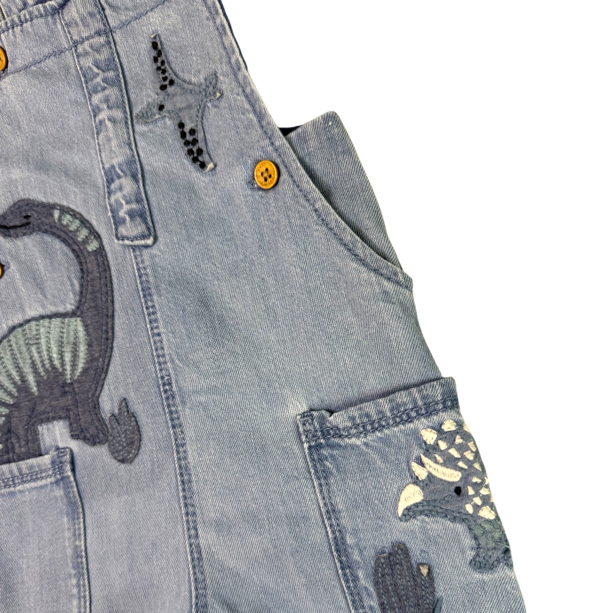 Modré lacle s dinosaury Next