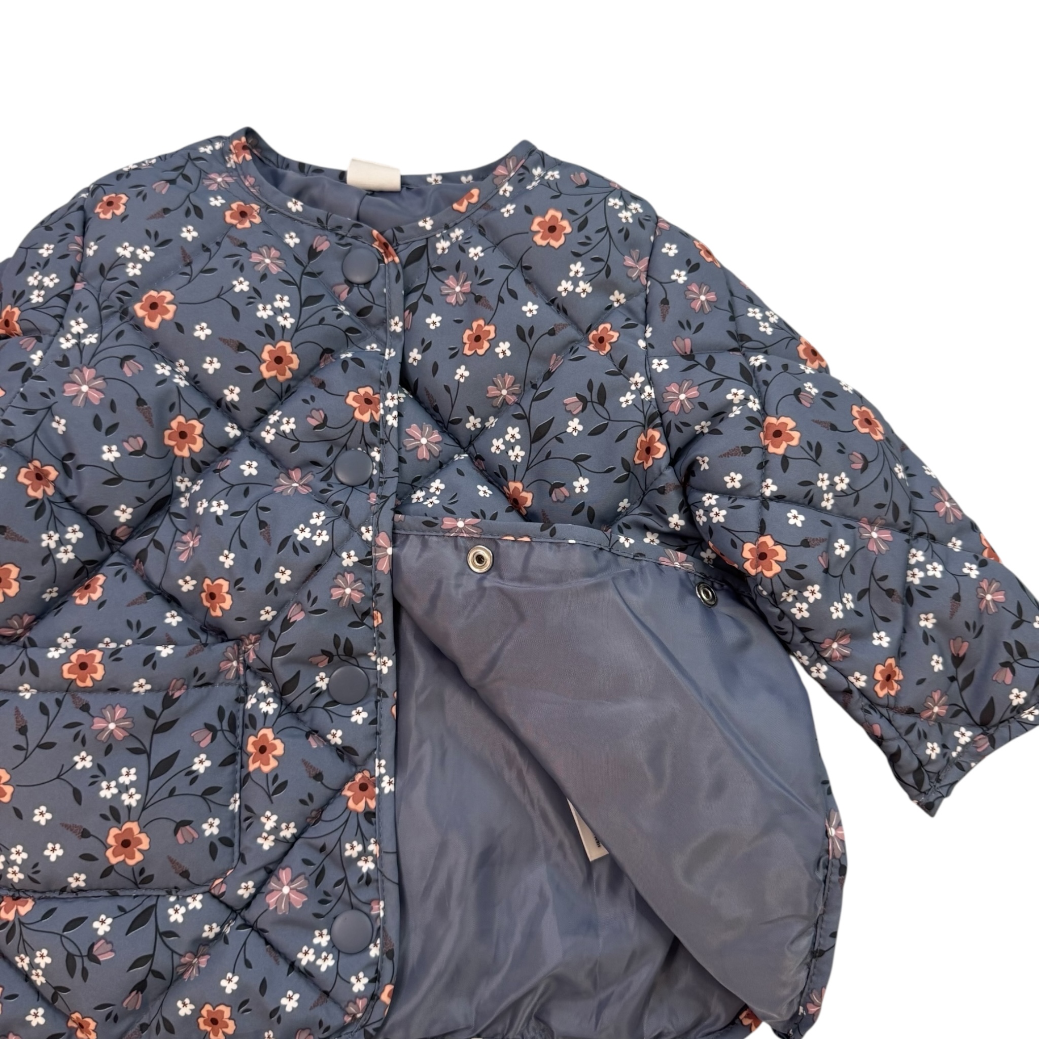 Modrý prošivaný bomber s květy H&M