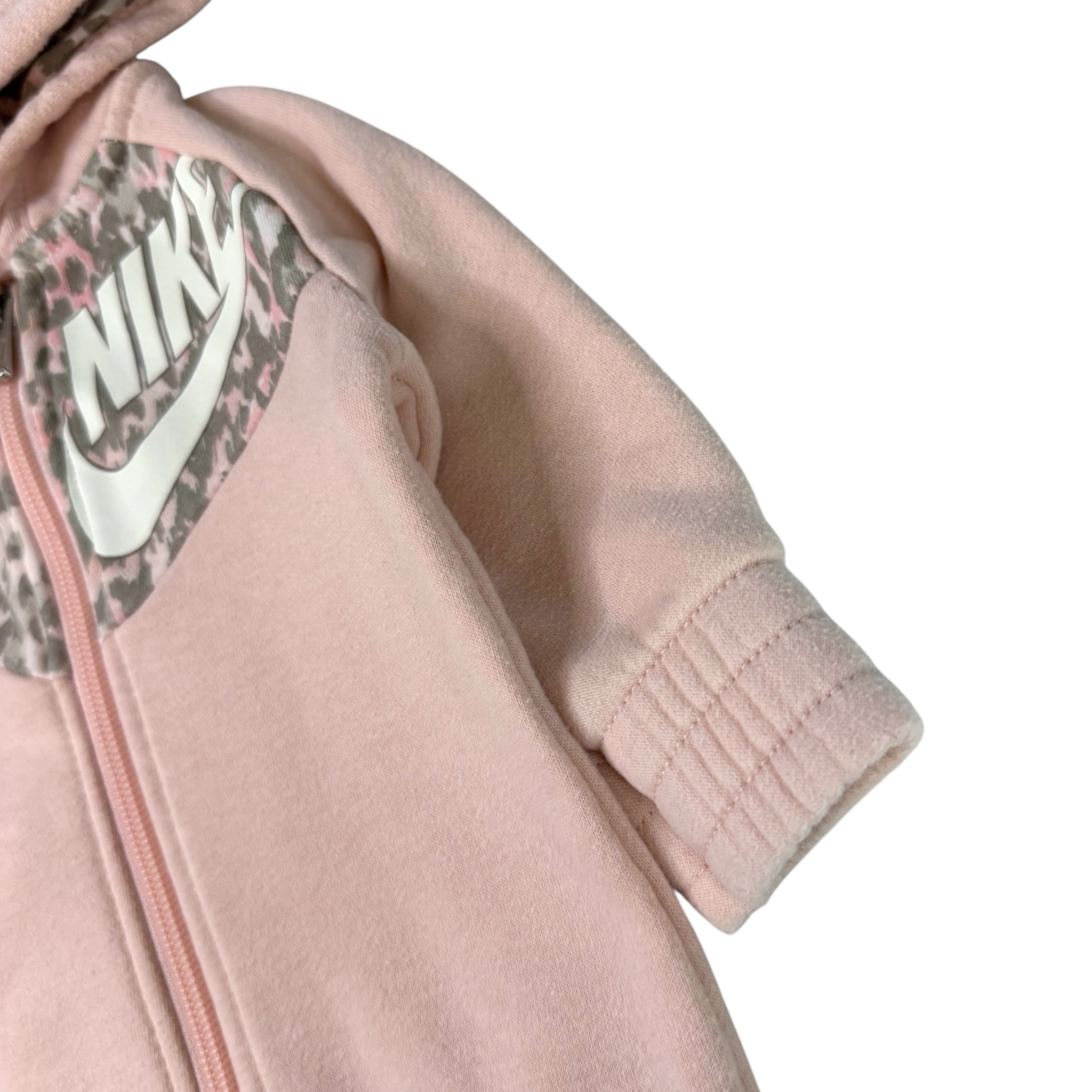 Růžový teplákový overal Nike