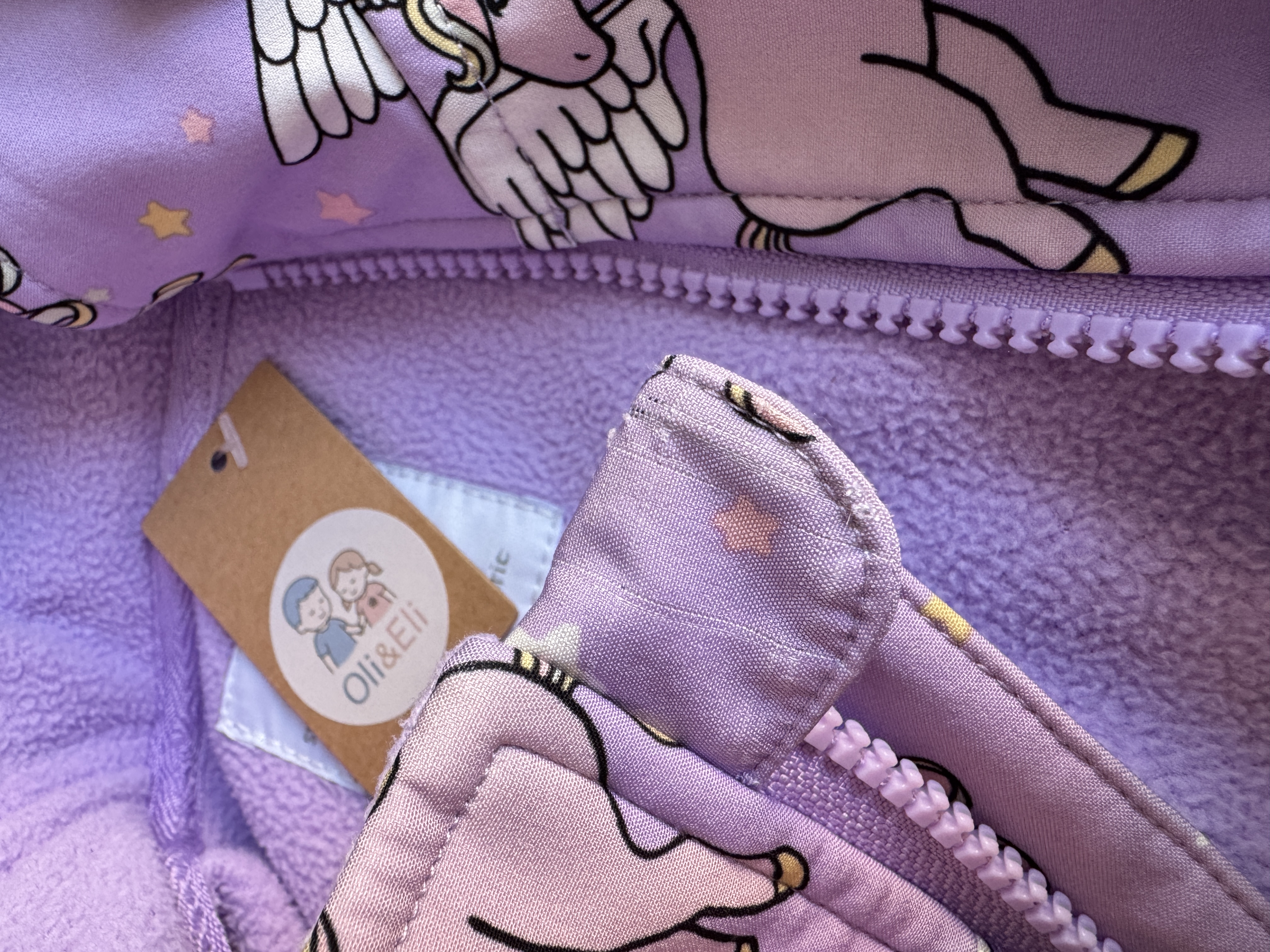 Lila softshellová bunda s jednorožci Lindex