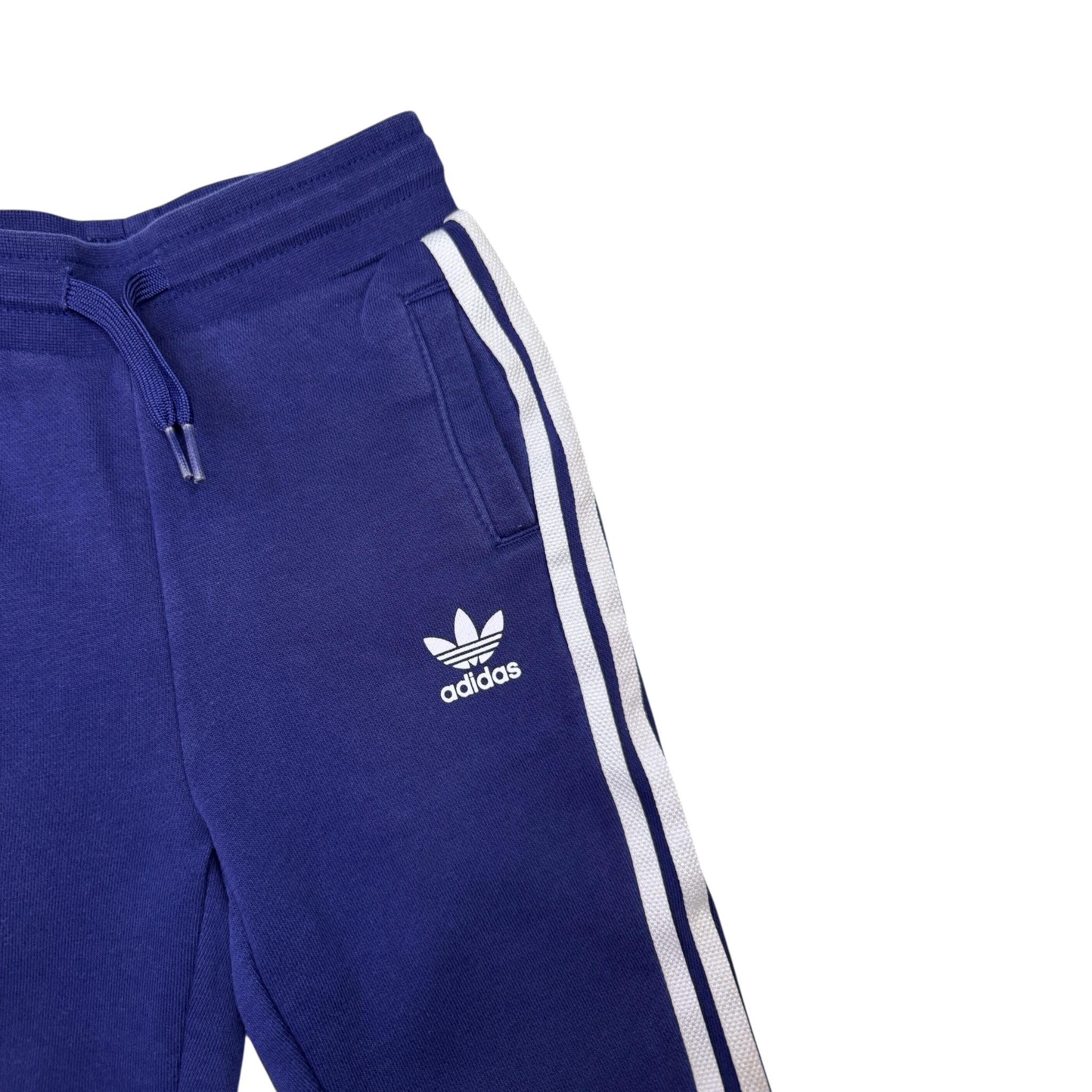 Modré tepláky s bílými pruhy Adidas